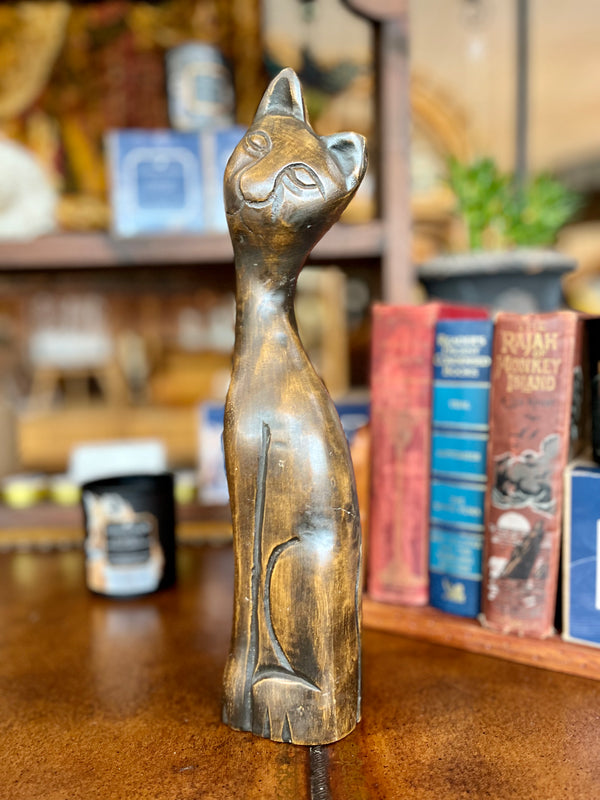 Staged wood cat statue